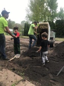 A group of people working on the ground