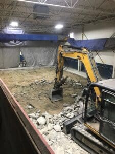 A construction site with a large pile of rubble.