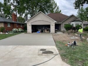 A garage with two doors open and the door is closed.